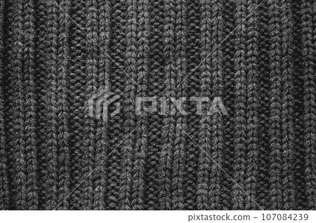 Handmade knitting background with macro weave threads. 107084239