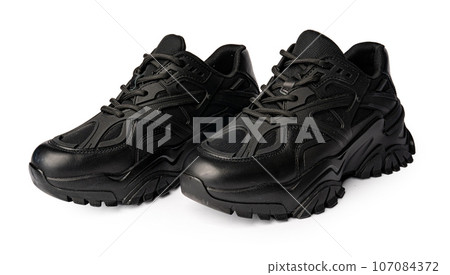 Pair of new sneakers isolated on white background Pair of new sneakers isolated on white background 107084372