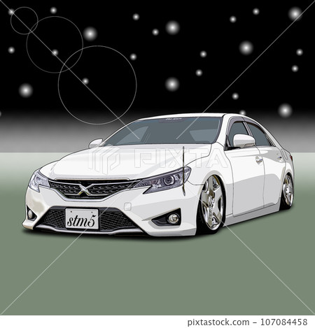 A white sports car driving along the coast with its lights on at night A white sports car driving along the coast with its lights on at night 107084458