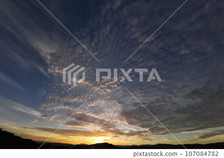 Early autumn morning sky with various clouds at sunrise, ultra-wide angle, sky-based, 230915am 107084782