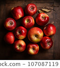 Autumn harvest: apples on the table 107087119