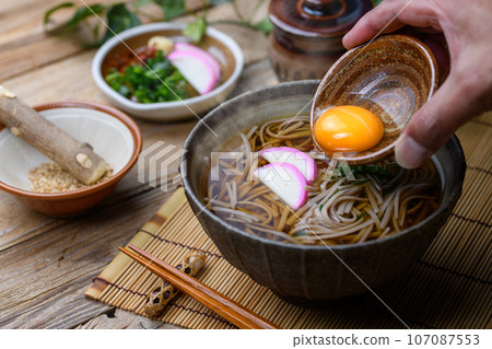 Tsukimi soba (kake soba) Tsukimi soba noodle dish Tsukimi soba (kake soba) Tsukimi soba noodle dish 107087553