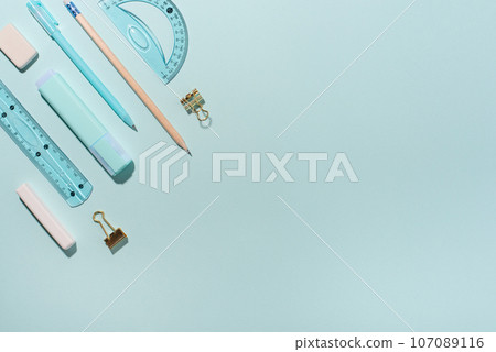 School supplies on blue background. School supplies on blue background. 107089116