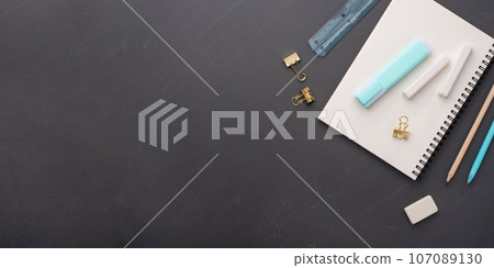 School supplies on black background. School supplies on black background. 107089130