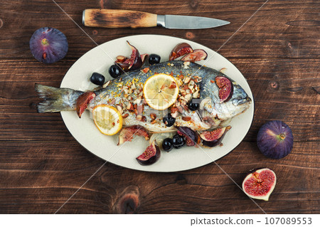 Tasty roasted dorado or gilt head bream fish 107089553
