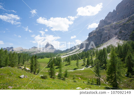 Dolomites range landscape. Summer mountain panorama Dolomites range landscape. Summer mountain panorama 107092149