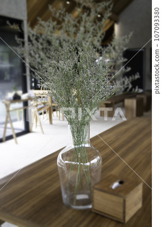 Coffee shop with wooden table Coffee shop with wooden table 107093380