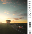 Porsche running along the skyline at sunrise 107093535