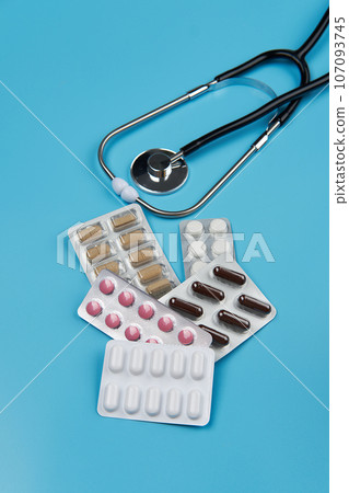 Virus or drug addiction concept. Abuse of opioid painkillers. Prescription medical drugs, tablets capsules and pills. Virus or drug addiction concept. Abuse of opioid painkillers. Prescription medical drugs, tablets capsules and pills. 107093745