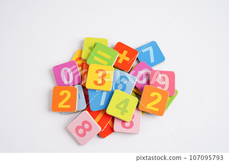 Number wood block cubes for learning Mathematic, education math concept. 107095793