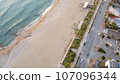Aerial view from the top at the road, sand and the sea at Alanya 107096344