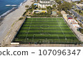 Aerial drone view at the football field near the sea at Alanya. 107096347