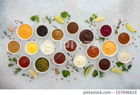 Different types of sauces in bowls 107096628