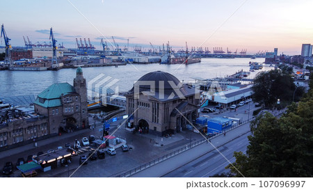 Awe drone point of view on another riverbank of Norderelbe of Hamburg (opposite to Landungsbrucken ) With tourboats, 107096997