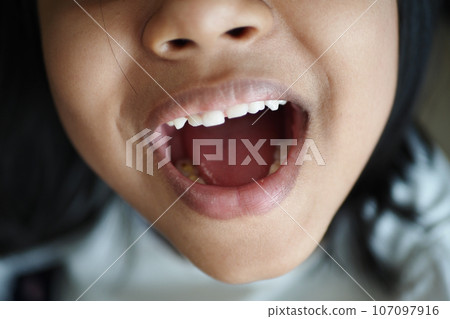 close up of child screaming at home close up of child screaming at home 107097916