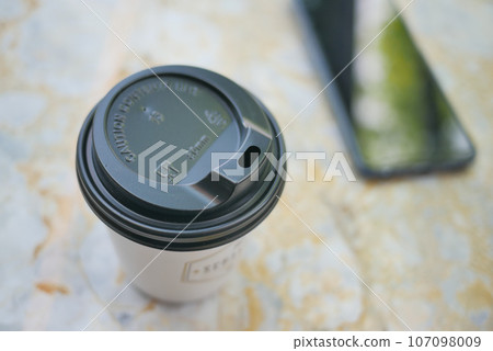 Blank take away kraft coffee cup on table , Blank take away kraft coffee cup on table , 107098009