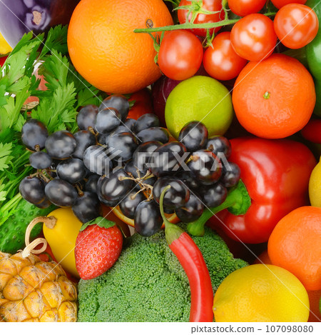 bright background from various vegetables and fruits. 107098080