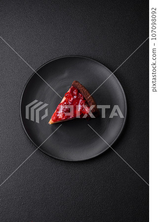 Delicious sweet cheesecake cake with mascarpone cheese, cherry berries and jam Delicious sweet cheesecake cake with mascarpone cheese, cherry berries and jam 107098092