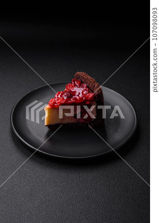 Delicious sweet cheesecake cake with mascarpone cheese, cherry berries and jam 107098093