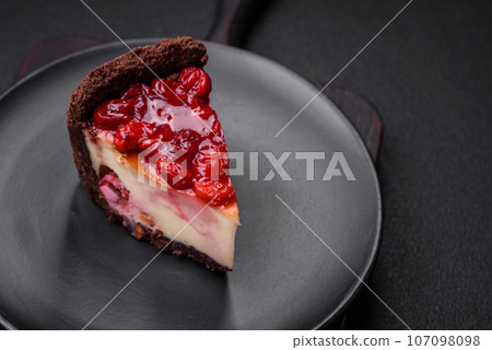 Delicious sweet cheesecake cake with mascarpone cheese, cherry berries and jam 107098098