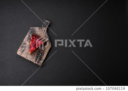 Delicious sweet cheesecake cake with mascarpone cheese, cherry berries and jam Delicious sweet cheesecake cake with mascarpone cheese, cherry berries and jam 107098119