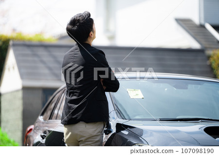 A car with a parking sticker 107098190