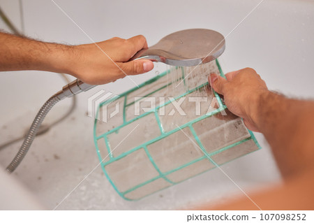 Washing air-conditioner filter with water 107098252