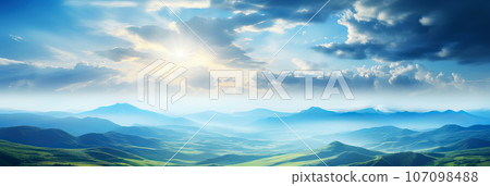 Beautiful aerial View of hilly landscape in morning mist with sun rays, banner format 107098488