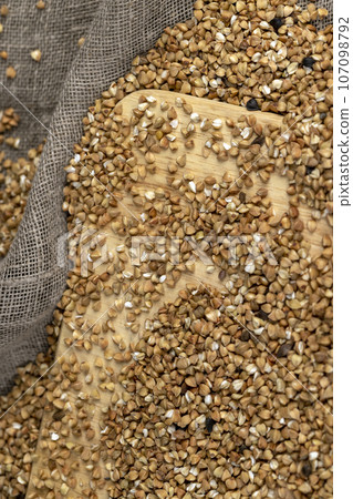 Poorly cleaned buckwheat groats for cooking porridge Poorly cleaned buckwheat groats for cooking porridge 107098792