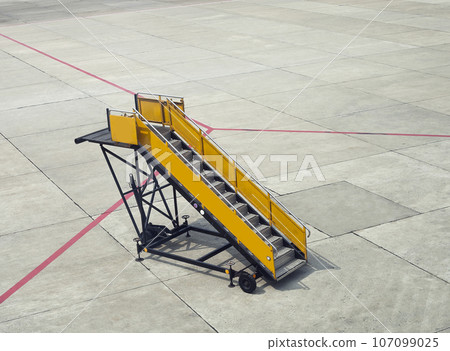 Ladder of plane. Empty gangway 107099025