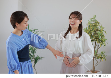 Woman training her voice after receiving advice from a voice trainer 1 107101613