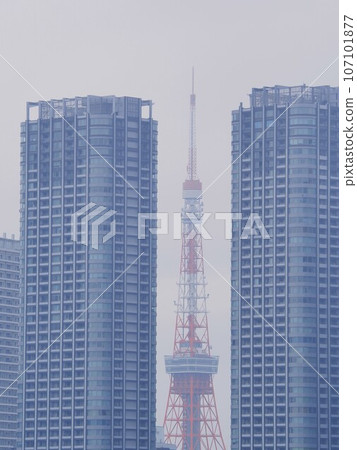 Tokyo Tower between buildings seen from Kachidoki Bridge, Tokyo, September Tokyo Tower between buildings seen from Kachidoki Bridge, Tokyo, September 107101877