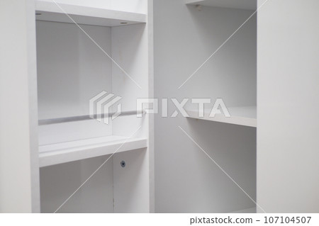 top view of a opened empty drawer  107104507