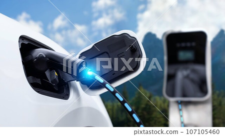 Electric car plugged in with charging station with nature background. Peruse 107105460