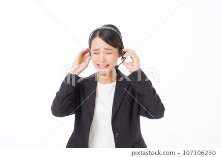 Photo of a woman receiving a complaint call Photo of a woman receiving a complaint call 107106230