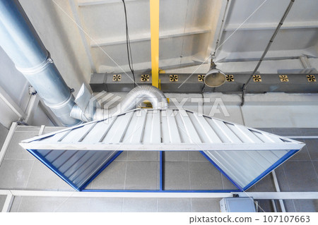 Industrial hood in production workshop. Room ventilation system. Background. 107107663
