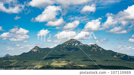 Mountains landscape. Idyllic mountain background. Panoramic view of beautiful mountain landscape 107110989