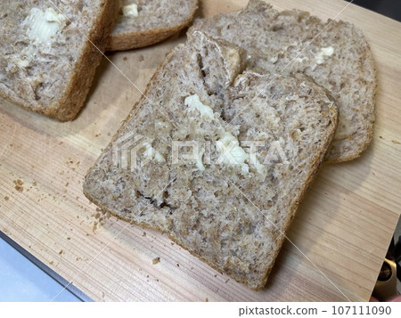 Whole wheat bread baked in a home bread maker: Healthy homemade bread 107111090