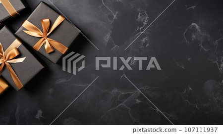 Black gift boxes arranged on dark background, black friday discounts concept 107111937