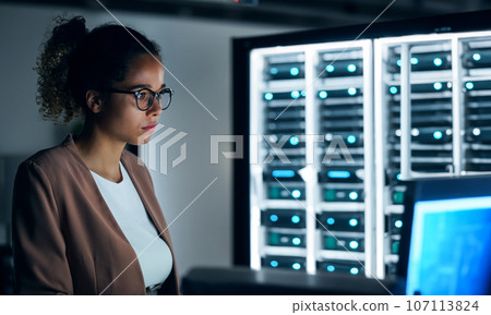 Foreign woman working in the server room 107113824