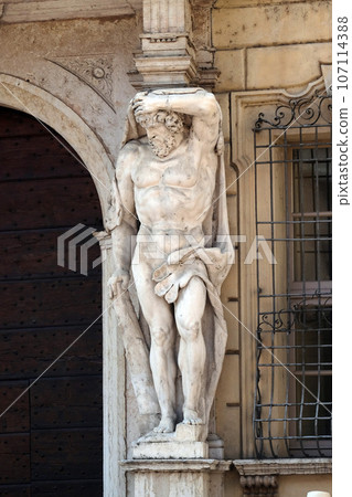 Statue of Hercules at the entrance to the 18th century Palazzo Vescovile (Bishops Palace) in the historical center of Mantua, Italy Statue of Hercules at the entrance to the 18th century Palazzo Vescovile (Bishops Palace) in the historical center of Mantua, Italy 107114388