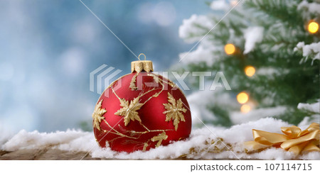 Christmas tree with snow forest and red ornament balls Christmas tree with snow forest and red ornament balls 107114715