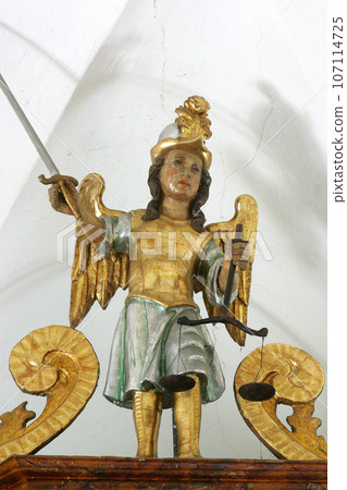 St. Michael the Archangel, statue on the high altar in the parish church of St. Peter in Sveti Petar Mreznicki, Croatia St. Michael the Archangel, statue on the high altar in the parish church of St. Peter in Sveti Petar Mreznicki, Croatia 107114725