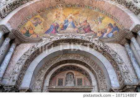 Christ in glory, bezel greater arch, the facade of the Saint Mark basilica, Venice, Italy Christ in glory, bezel greater arch, the facade of the Saint Mark basilica, Venice, Italy 107114807