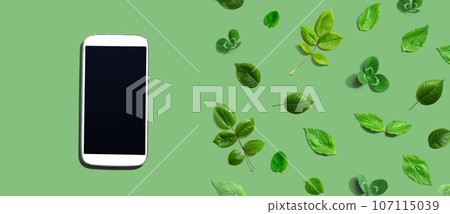 White smartphone with green leaves White smartphone with green leaves 107115039