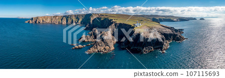 Aerial view of the lighthouse on the island of Arranmore in County Donegal, Ireland 107115693