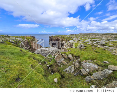 The cliffs close to the Lighthouse on Tory Island, County Donegal, Republic of Ireland The cliffs close to the Lighthouse on Tory Island, County Donegal, Republic of Ireland 107116695