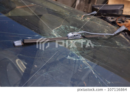 Broken car windshield. Accident of car. Selective focus. Broken car windshield. Accident of car. Selective focus. 107116864