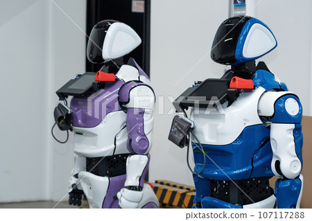 two humanoid robots guides with medical functions in the workshop where they were assembled two humanoid robots guides with medical functions in the workshop where they were assembled 107117288