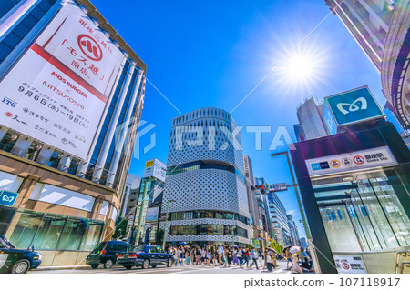 Tokyo cityscape in Japan: For tomorrow. Ginza is bustling with coronavirus relief. The blue sky spreads... What wisdom brings... = September 13th Tokyo cityscape in Japan: For tomorrow. Ginza is bustling with coronavirus relief. The blue sky spreads... What wisdom brings... = September 13th 107118917